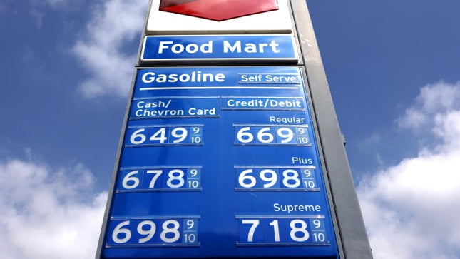The image of high gas prices displayed on a Chevron sign shows a ratio of 9/10